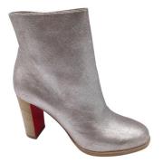 Christian Louboutin Pre-owned Silver Metallic Läderstövlar Gray, Dam