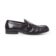 Tod's Svarta platta skor med guldlogotyp Black, Herr