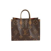 Louis Vuitton Vintage Pre-owned Canvas handvskor Brown, Dam