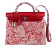 Hermès Vintage Pre-owned Canvas handvskor Red, Dam