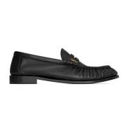 Saint Laurent Svarta läderloafers med Cassandre-logotyp Black, Dam