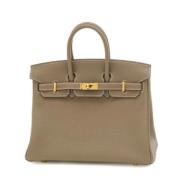 Hermès Vintage Pre-owned Laeder handvskor Beige, Dam