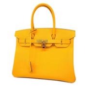 Hermès Vintage Pre-owned Tyg handvskor Yellow, Dam