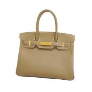 Hermès Vintage Pre-owned Tyg handvskor Beige, Dam