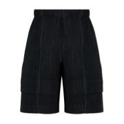 Issey Miyake Veckade shorts av Homme Plisse Black, Herr