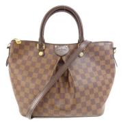 Louis Vuitton Vintage Pre-owned Tyg handvskor Brown, Dam