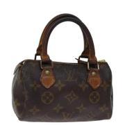 Louis Vuitton Vintage Pre-owned Canvas handvskor Brown, Dam