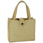 Chanel Vintage Pre-owned Nylon handvskor Beige, Dam