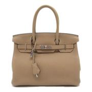 Hermès Vintage Pre-owned Laeder handvskor Beige, Dam