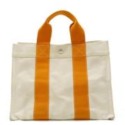 Hermès Vintage Pre-owned Canvas handvskor Beige, Dam