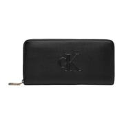 Calvin Klein Jeans Deboss dragkedja plånbok Black, Dam