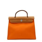 Hermès Vintage Pre-owned Canvas handvskor Orange, Dam