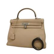 Hermès Vintage Pre-owned Laeder handvskor Beige, Dam