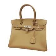 Hermès Vintage Pre-owned Laeder handvskor Beige, Dam