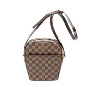 Louis Vuitton Vintage Pre-owned Belagd canvas axelremsvskor Brown, Dam