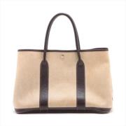 Hermès Vintage Pre-owned Canvas handvskor Beige, Herr