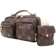 Louis Vuitton Vintage Pre-owned Canvas axelremsvskor Brown, Dam