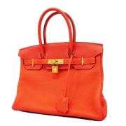 Hermès Vintage Pre-owned Laeder handvskor Orange, Dam