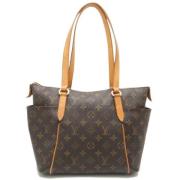 Louis Vuitton Vintage Pre-owned Canvas axelremsvskor Brown, Dam