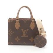 Louis Vuitton Vintage Pre-owned Canvas handvskor Beige, Dam