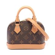 Louis Vuitton Vintage Pre-owned Canvas handvskor Brown, Dam