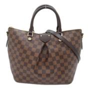 Louis Vuitton Vintage Pre-owned Tyg handvskor Brown, Dam