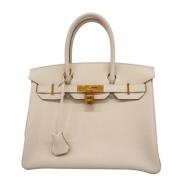 Hermès Vintage Pre-owned Laeder handvskor Beige, Dam