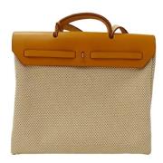 Hermès Vintage Pre-owned Canvas handvskor Beige, Dam