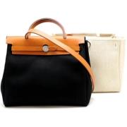 Hermès Vintage Pre-owned Canvas handvskor Black, Dam