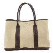 Hermès Vintage Pre-owned Canvas handvskor Beige, Dam