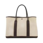 Hermès Vintage Pre-owned Canvas handvskor Beige, Dam