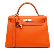 Hermès Vintage Pre-owned Laeder handvskor Orange, Dam