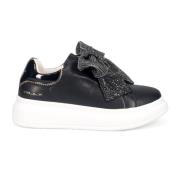 Tosca Blu Svart läder slip-on sneaker med rosett Black, Dam