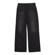 Won Hundred Coated Denim Unisex Jeans i Svart Black, Herr