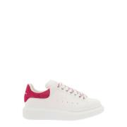 Alexander McQueen Vita låga sneakers med fuchsia mockahäl White, Dam