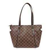 Louis Vuitton Vintage Pre-owned Canvas axelremsvskor Brown, Dam