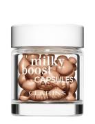 Milky Boost Capsules 06 Foundation Smink Clarins